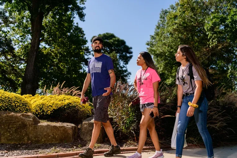 Students walking in front of Plumb Hall