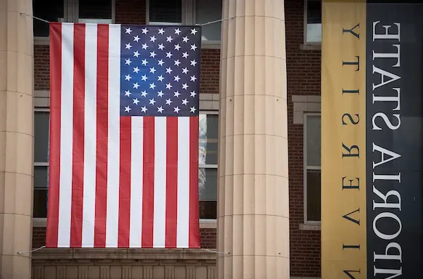 Flag hanging from Emporia State's Plumb Hall